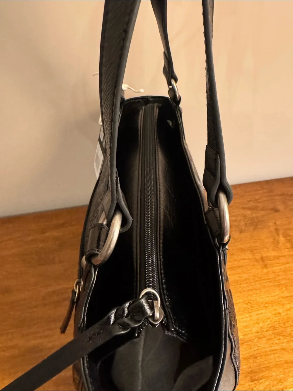 The Sak Bolinas Satchel in Black Floral Embossed Leather